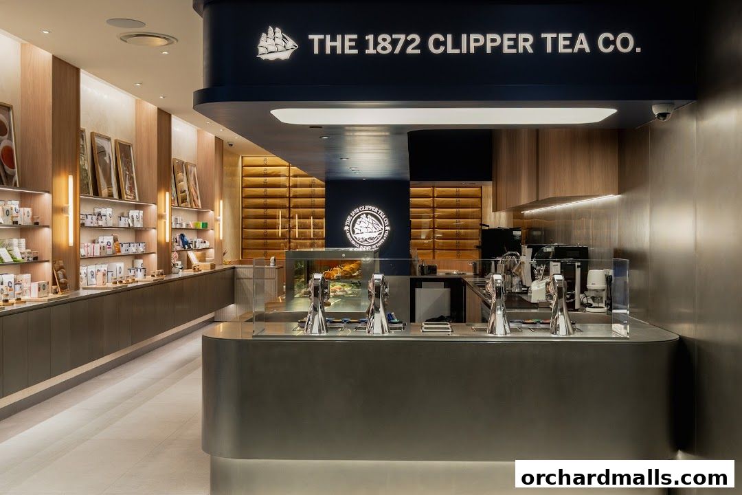 Interior of The 1872 Clipper Tea Co. shop with a counter and shelves displaying tea products.
