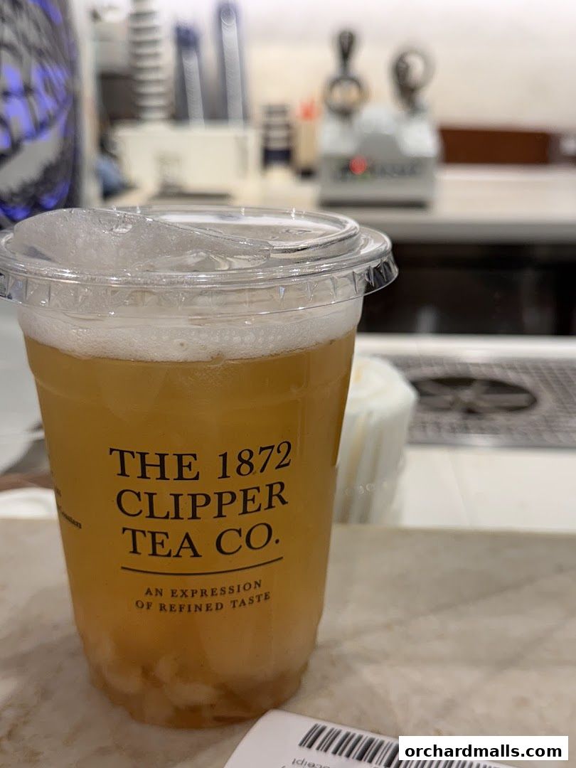 A close-up of a takeaway tea drink from The 1872 Clipper Tea Co.