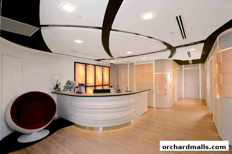 The modern reception area of The Chelsea Clinic features a sleek counter and unique seating.