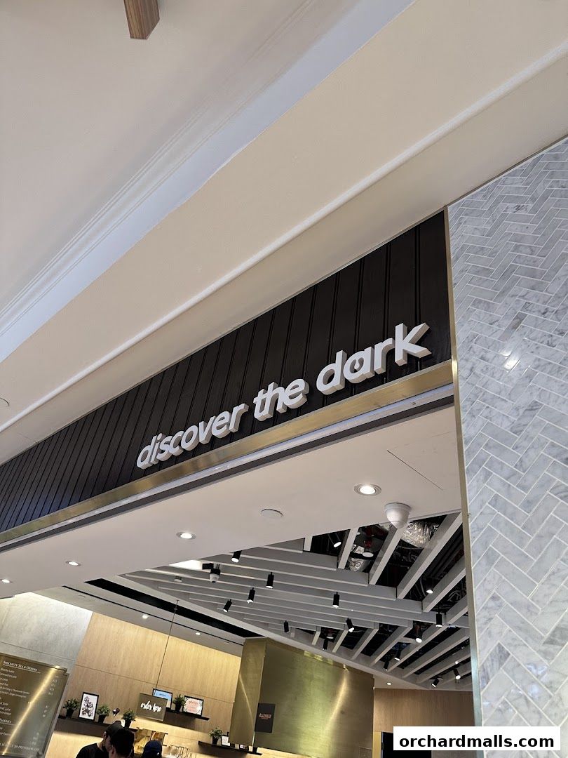 The entrance to 'The Dark Gallery' shop with the slogan 'discover the dark'.