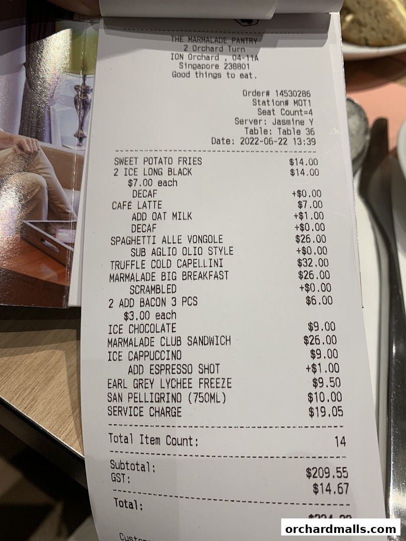 A receipt from The Marmalade Pantry listing food and drink items with prices.