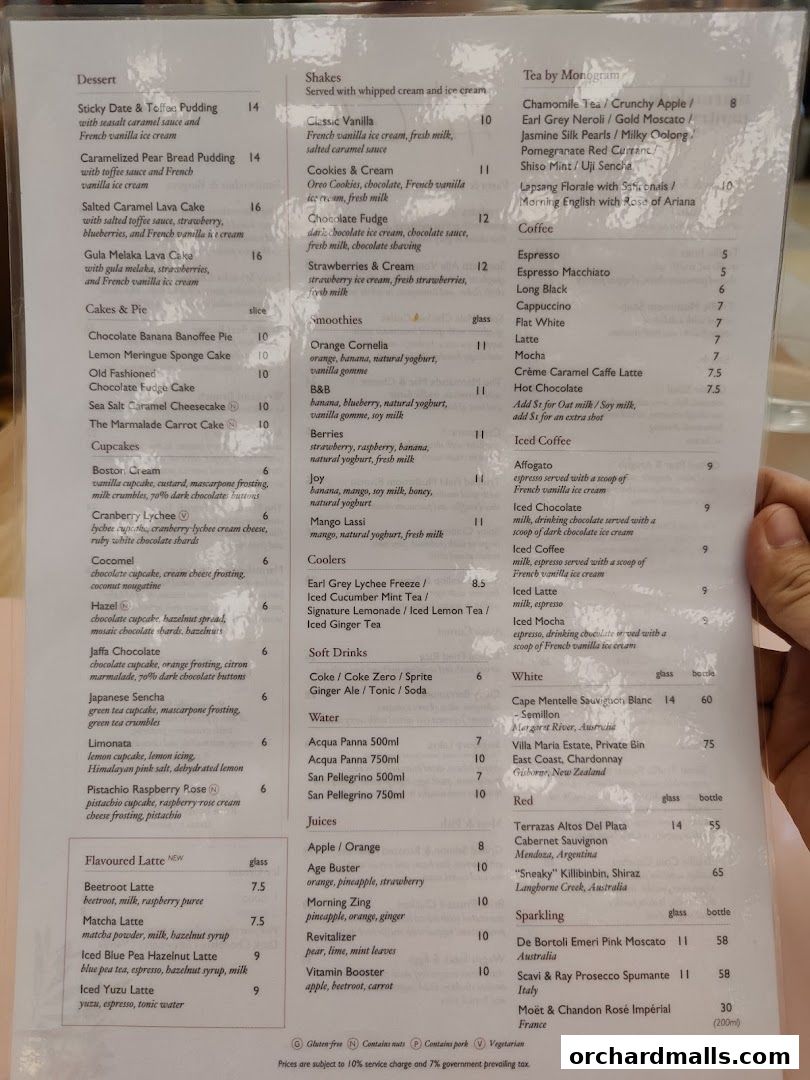 A menu from The Marmalade Pantry cafe bistro with desserts, shakes, smoothies, coffee, tea, juices, and alcoholic beverages.