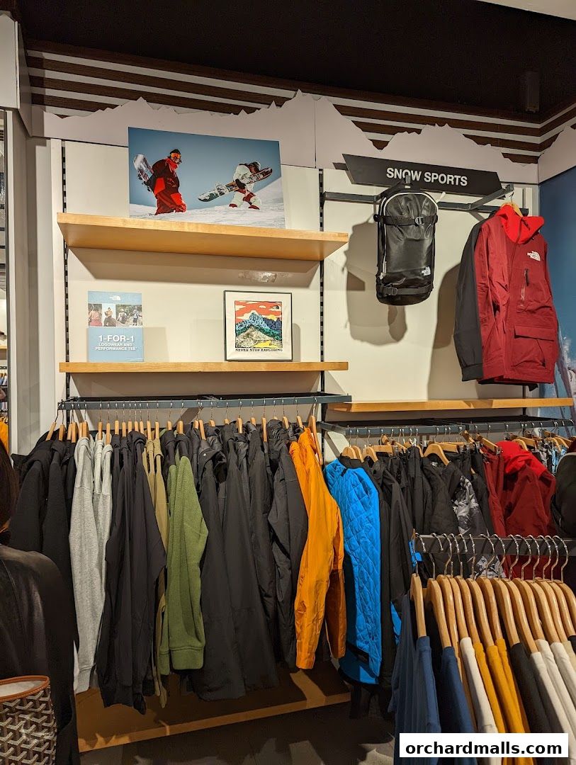 Interior view of The North Face shop showcasing winter sports apparel and accessories.