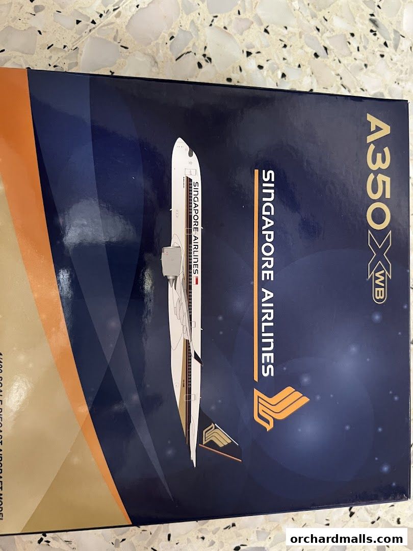 A box featuring a Singapore Airlines A350XWB aircraft model.
