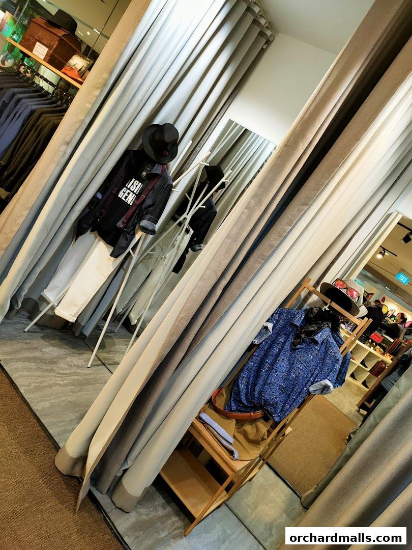Mannequins display stylish outfits inside The Shirt Bar, Wheelock Place.