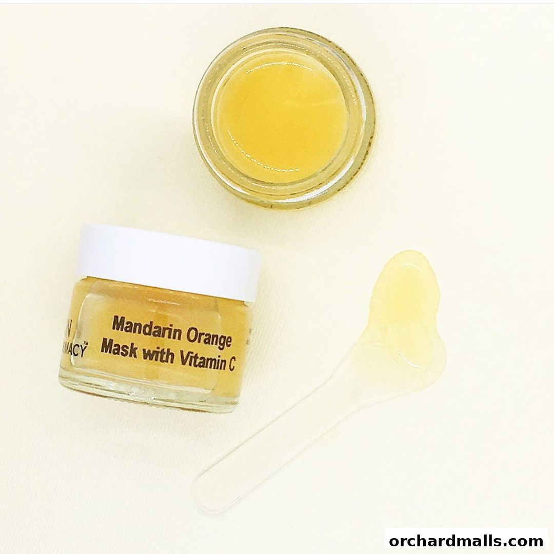 A small jar of Mandarin Orange Mask with Vitamin C and a spatula.