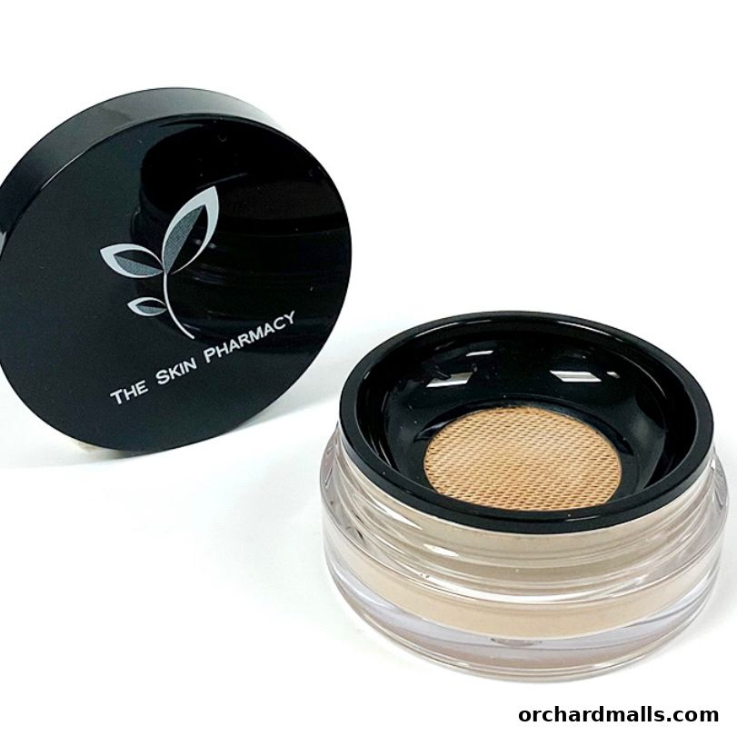 A black-lidded jar of The Skin Pharmacy loose powder makeup.