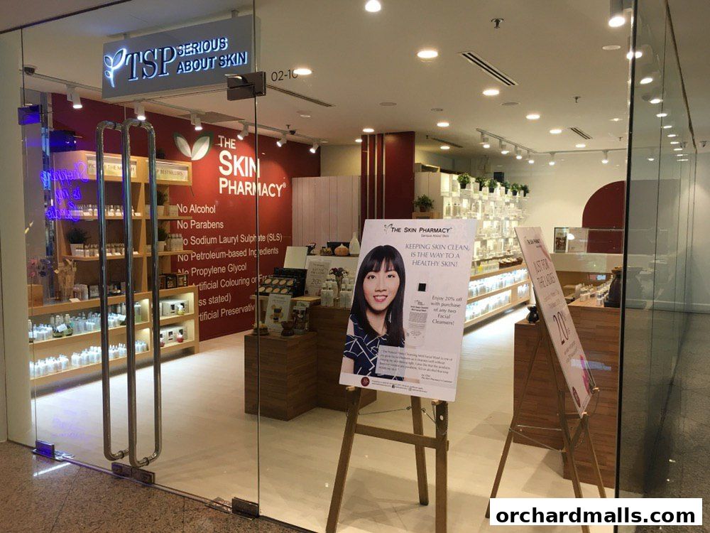 The Skin Pharmacy storefront with products displayed inside and promotional posters outside.