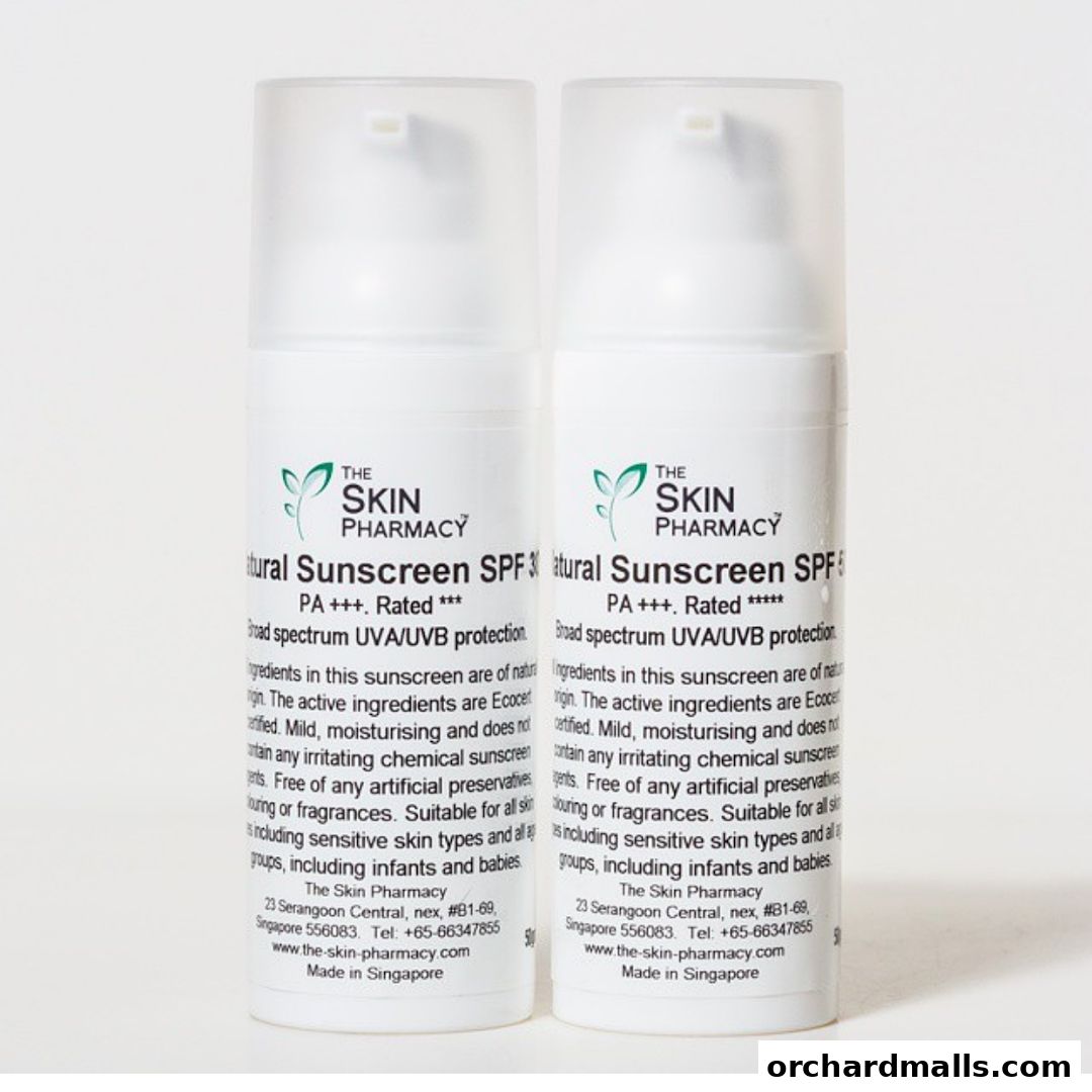 Two bottles of The Skin Pharmacy Natural Sunscreen SPF 50 with PA+++ rating.