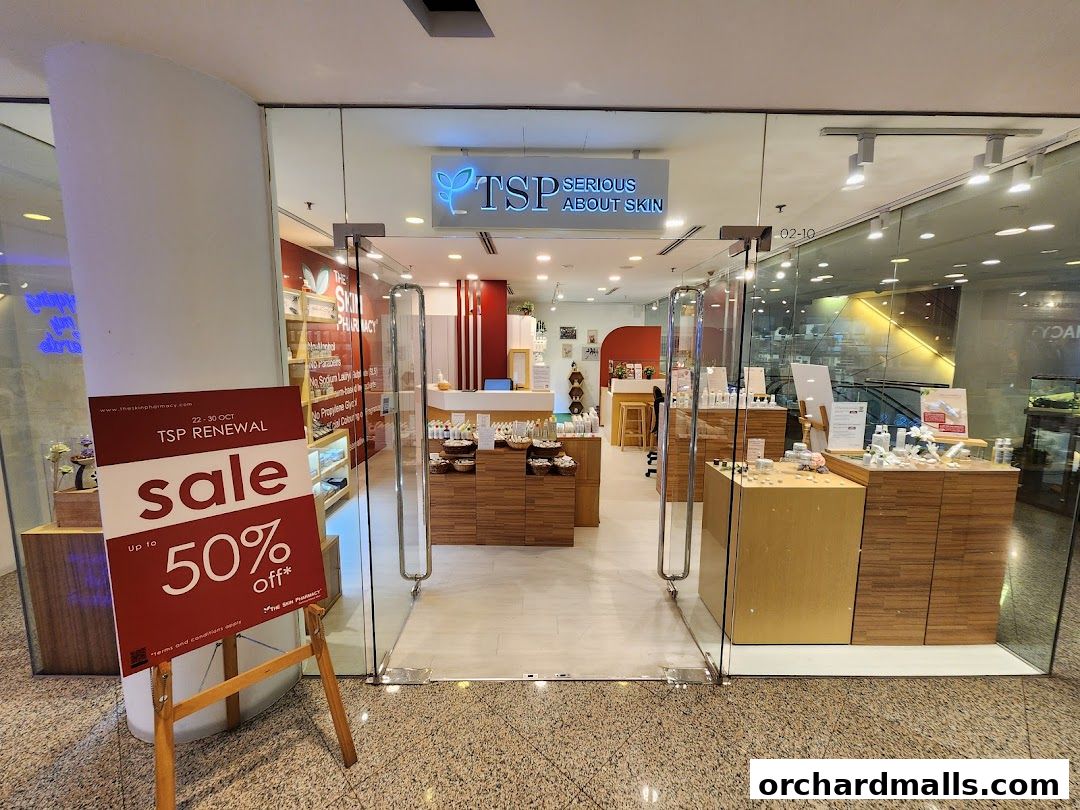 The Skin Pharmacy shop entrance with a sale sign and display of skincare products.