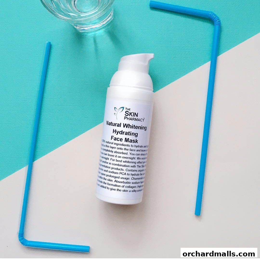 A bottle of The Skin Pharmacy Natural Whitening Hydrating Face Mask with straws and a glass.