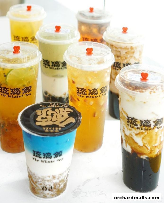 A variety of colorful bubble teas and fruit teas from The Whale Tea.
