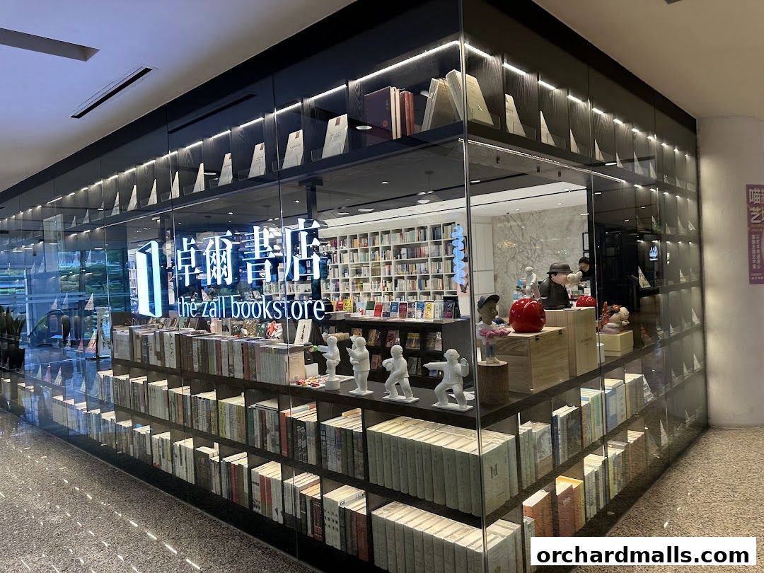 The Zall Bookstore features a modern glass facade displaying books and decorative items.