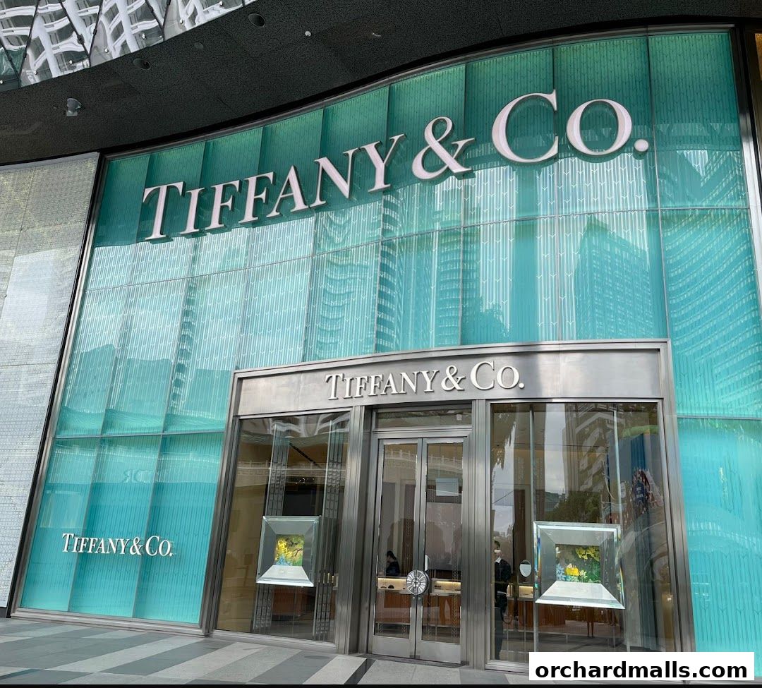 The exterior of a Tiffany & Co. store with its iconic logo and turquoise facade.