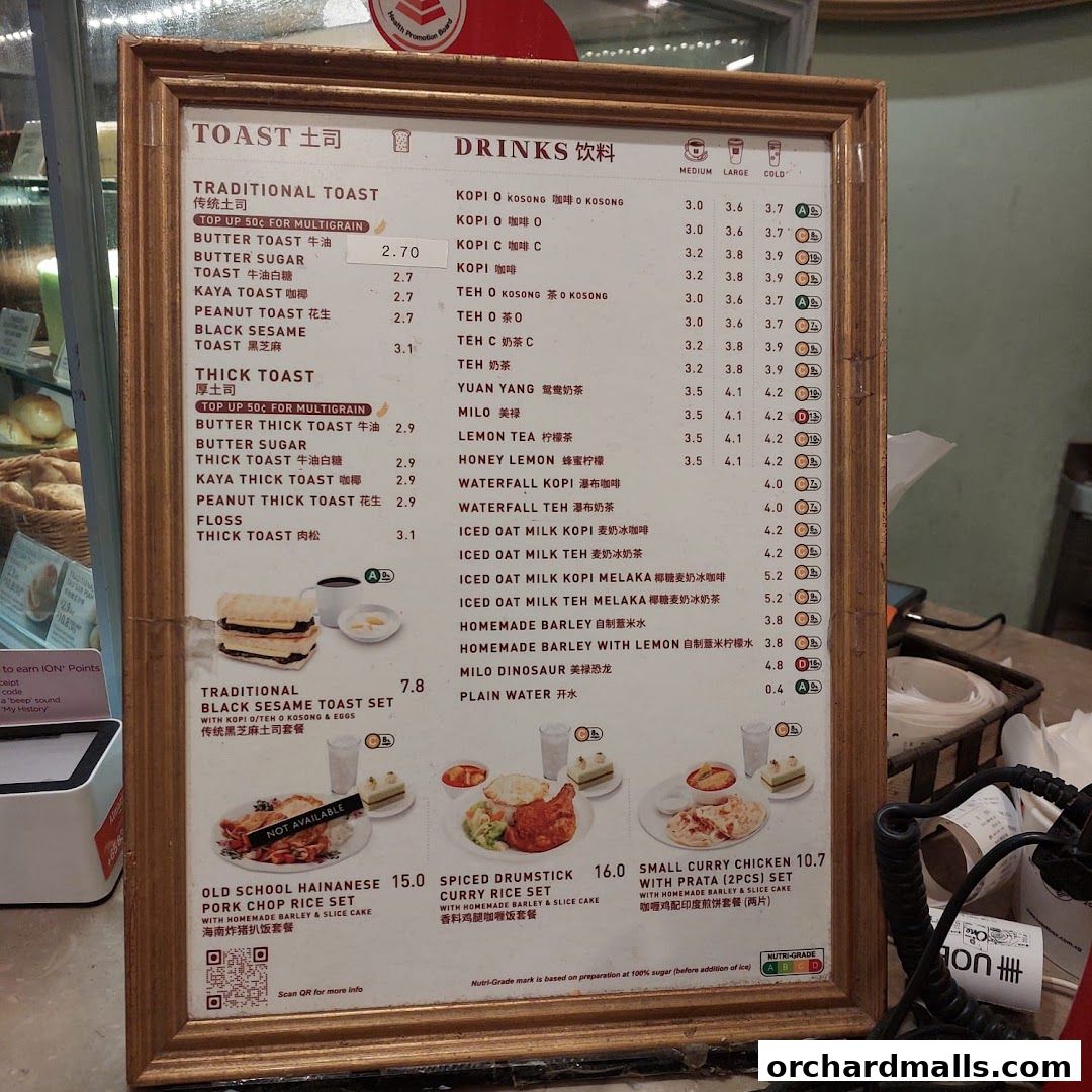 A menu board displaying traditional and thick toasts, drinks, and meal sets with prices.