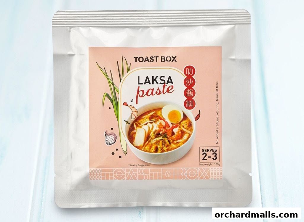 A package of Toast Box Laksa paste, featuring a bowl of laksa and ingredients.