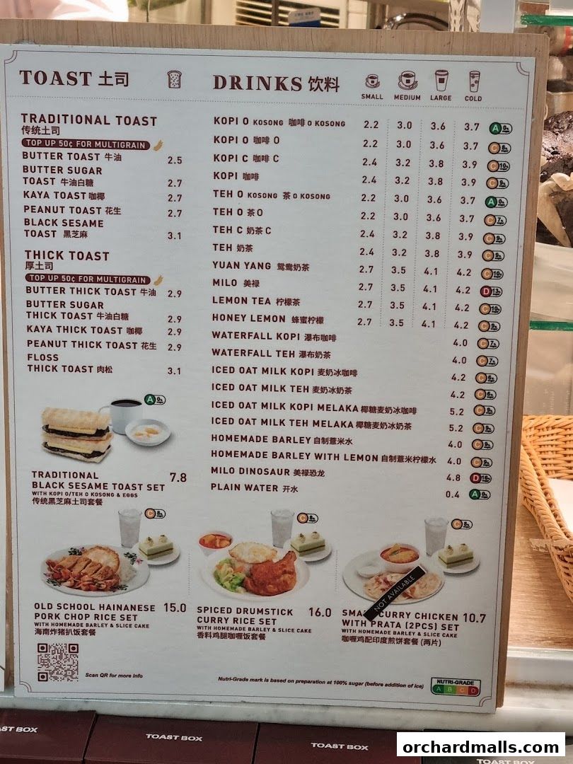 A menu board displaying traditional toasts, thick toasts, drinks, and set meals with prices.