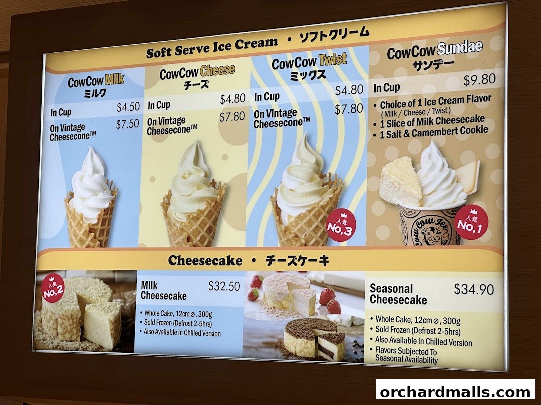 A menu board displaying various soft-serve ice creams and cheesecakes from Tokyo Milk Cheese Factory.