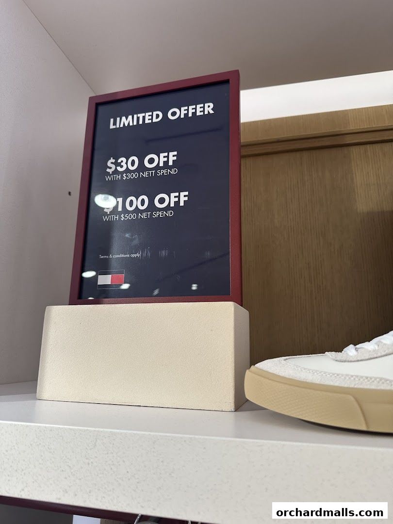 A sign advertising a limited offer with discounts for spending $300 or $500.