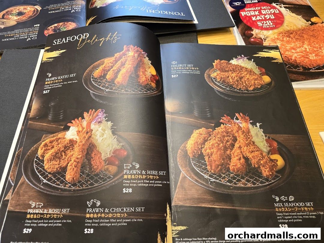 A menu from Tonkichi showcasing various seafood and pork katsu sets with prices.