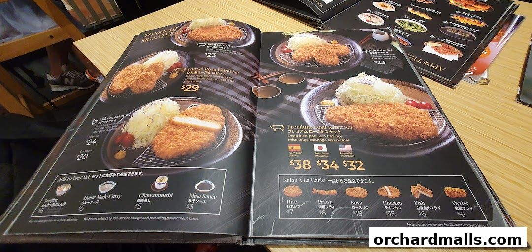 A menu from Tonkichi restaurant showcasing various katsu sets and a la carte options.