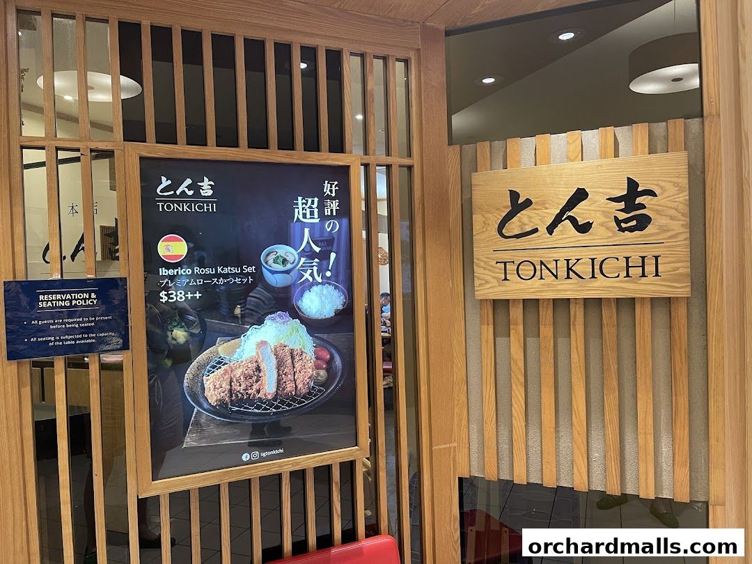 The entrance to Tonkichi restaurant, featuring a sign and a poster of a popular Iberico Rosu Katsu Set.