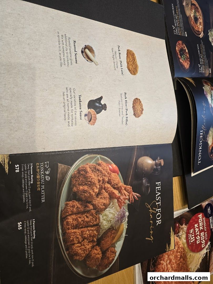 A menu from Tonkichi featuring tonkatsu platters and descriptions of ingredients.