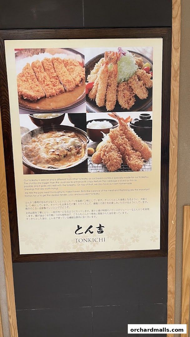 A menu board showcasing delicious tonkatsu and shrimp dishes with descriptive text.