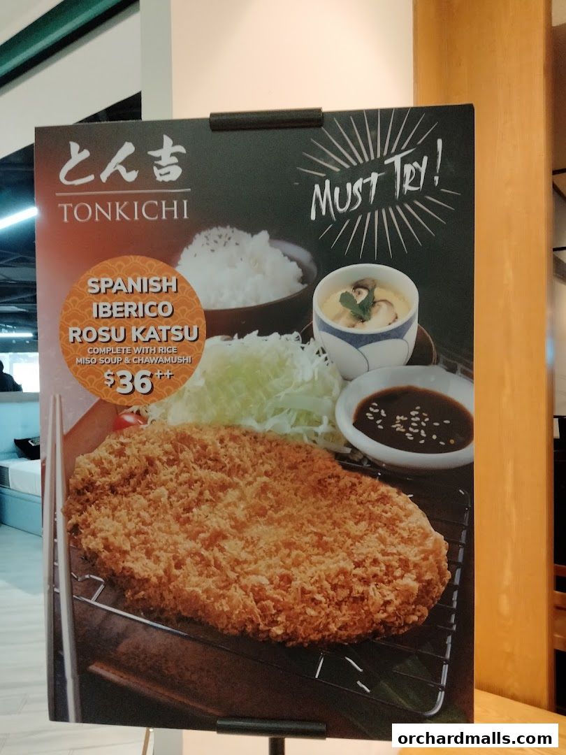 A sign advertising Tonkichi's Spanish Iberico Rosu Katsu meal.