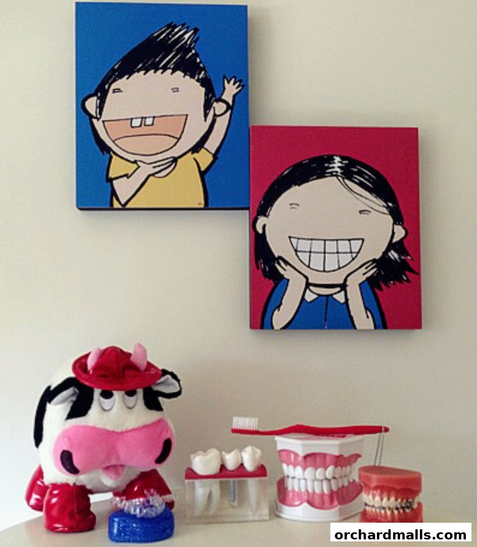 A dental clinic display featuring cartoon art, a plush cow, and dental models.