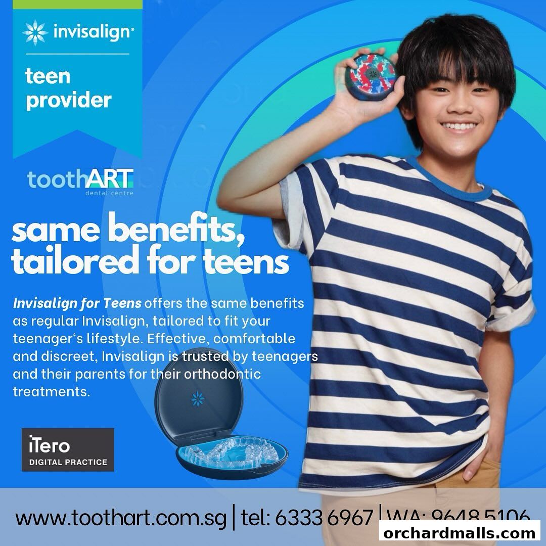 A smiling teen boy holds an Invisalign case and aligners, promoting orthodontic treatment.