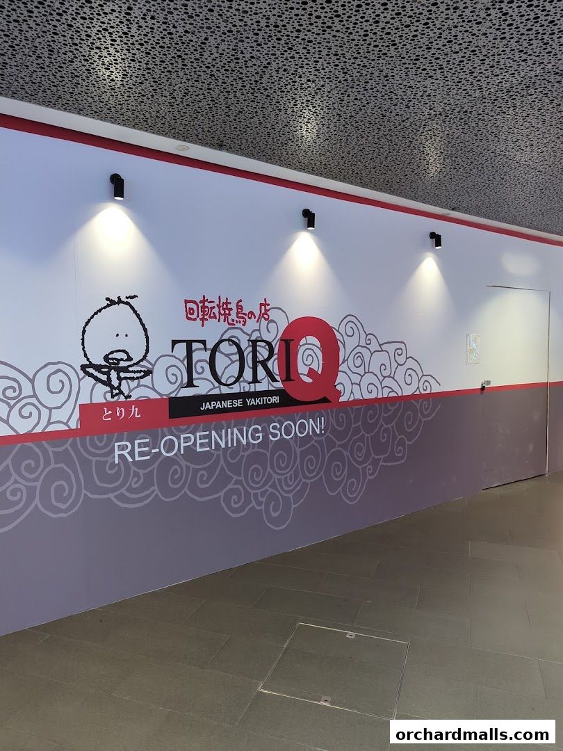 A wall with the TORI-Q Japanese Yakitori logo and 'RE-OPENING SOON!' text.