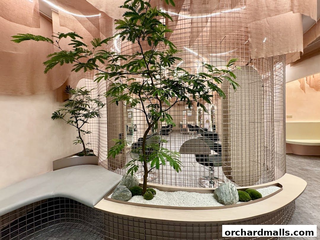 Interior of a luxurious hair growth and scalp treatment salon with plants and modern seating.