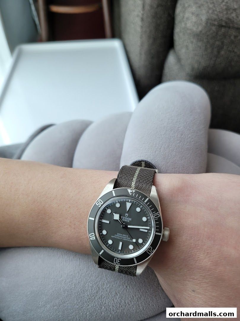 A close-up shot of a Tudor Black Bay Fifty-Eight watch on a person's wrist.