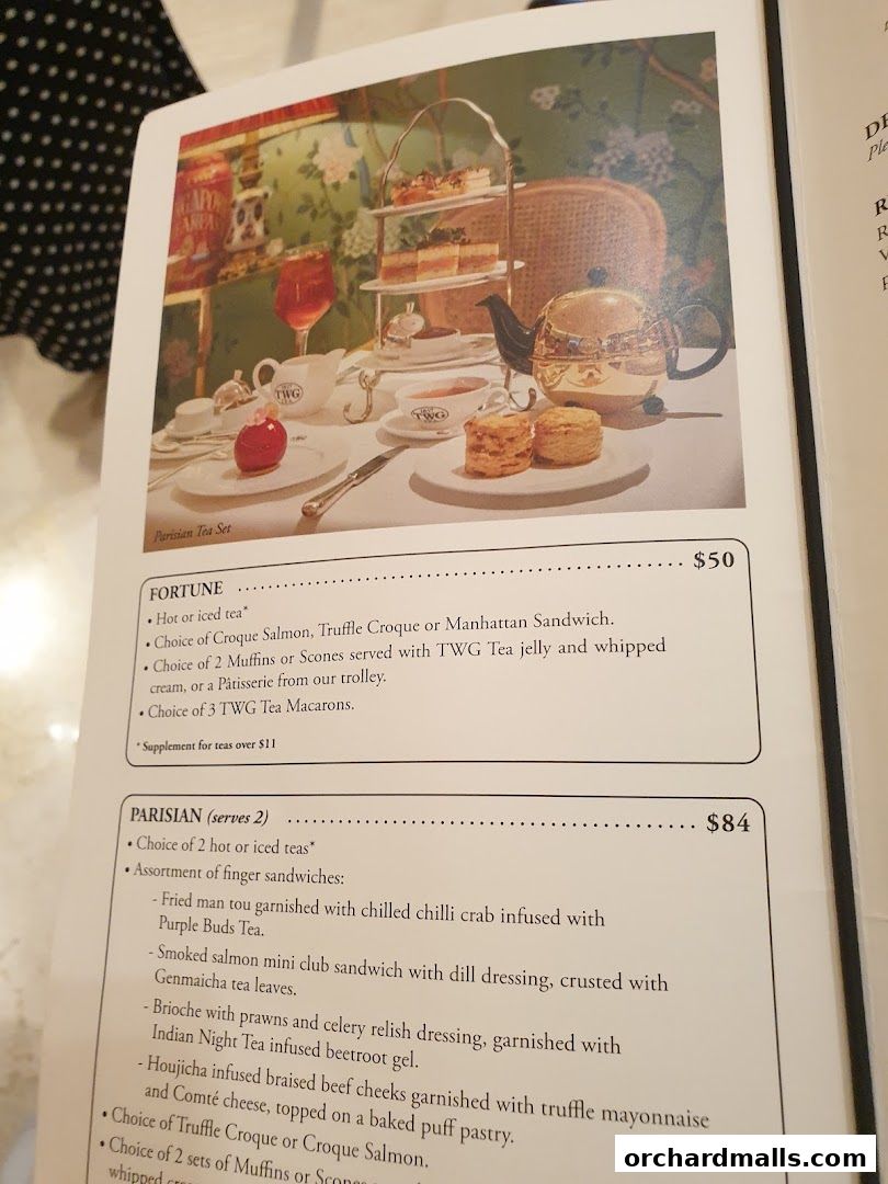 A menu page showcasing TWG Tea's Fortune and Parisian tea sets with detailed descriptions.