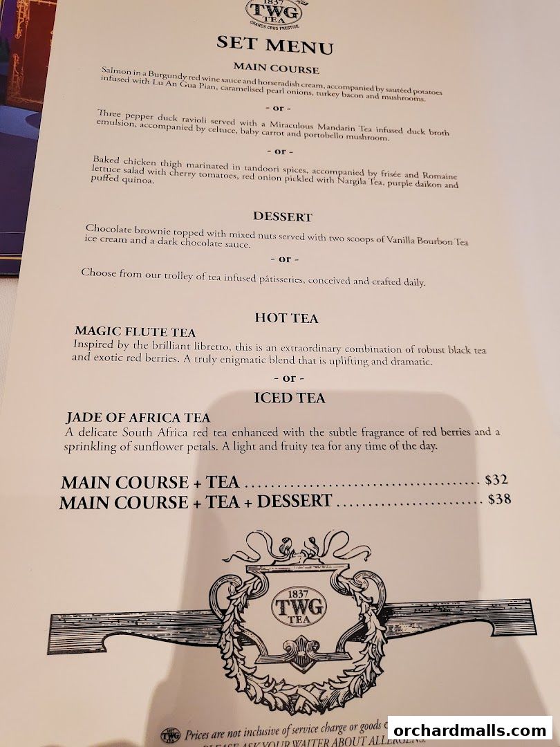 A set menu from TWG Tea featuring main courses, desserts, and teas with prices.