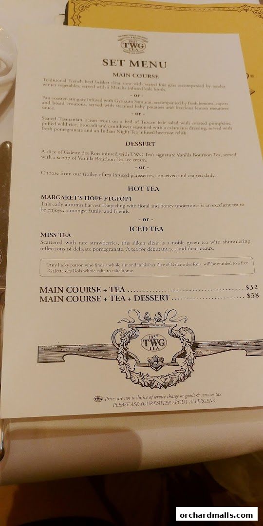 A menu from TWG Tea featuring set menus with main courses, desserts, and teas.