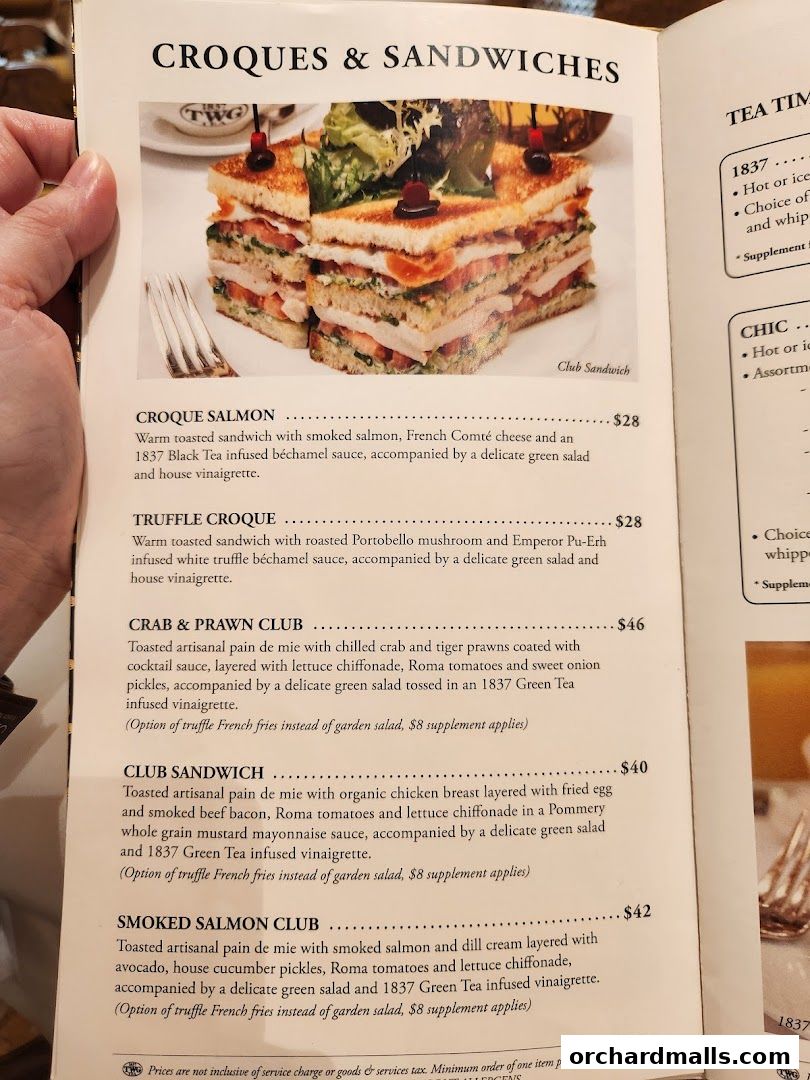 A menu page from TWG Tea featuring a selection of croques and sandwiches.