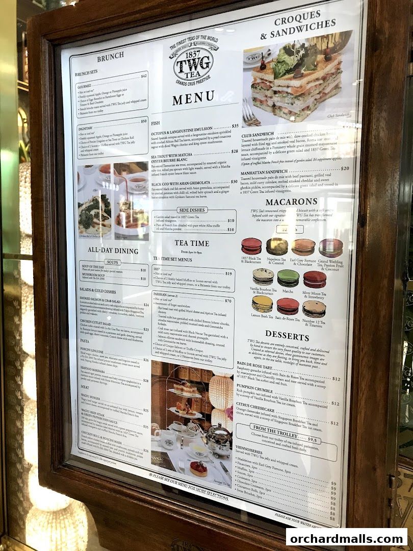 A menu board displaying various food and drink options from TWG Tea.