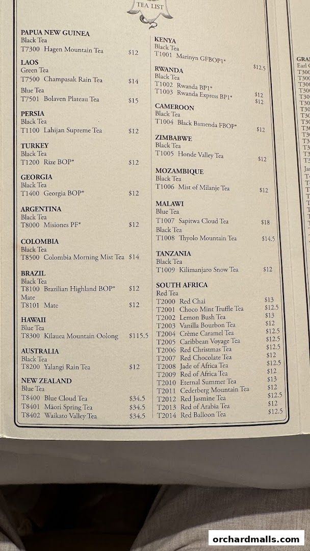 A tea list menu with various teas categorized by origin and type.