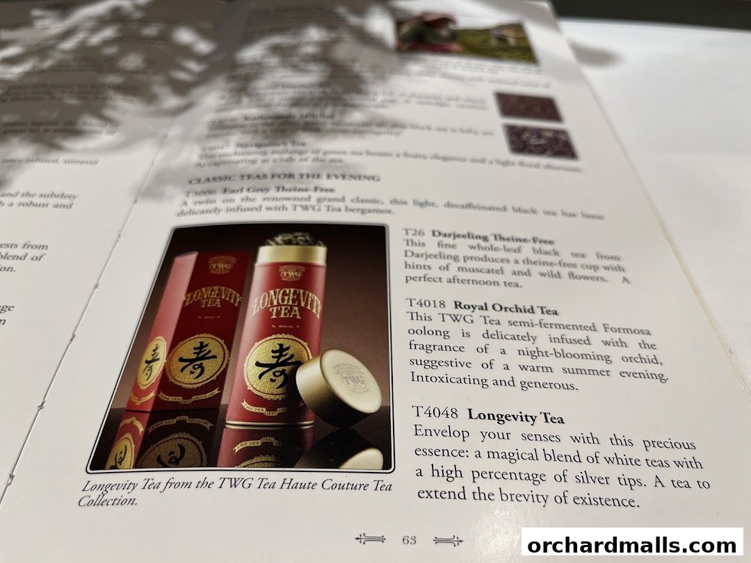 A page from a TWG Tea catalog showcasing various tea descriptions and product images.