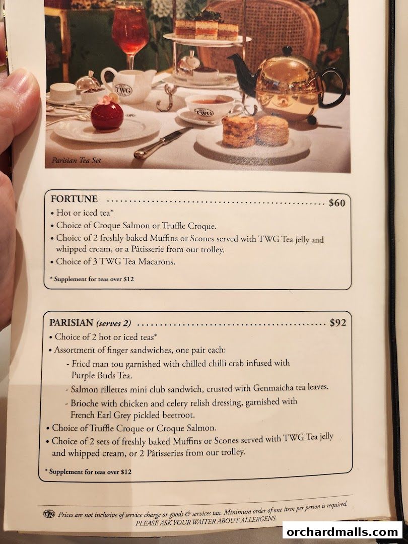 A menu showcasing TWG Tea's Fortune and Parisian tea sets with accompanying food items.