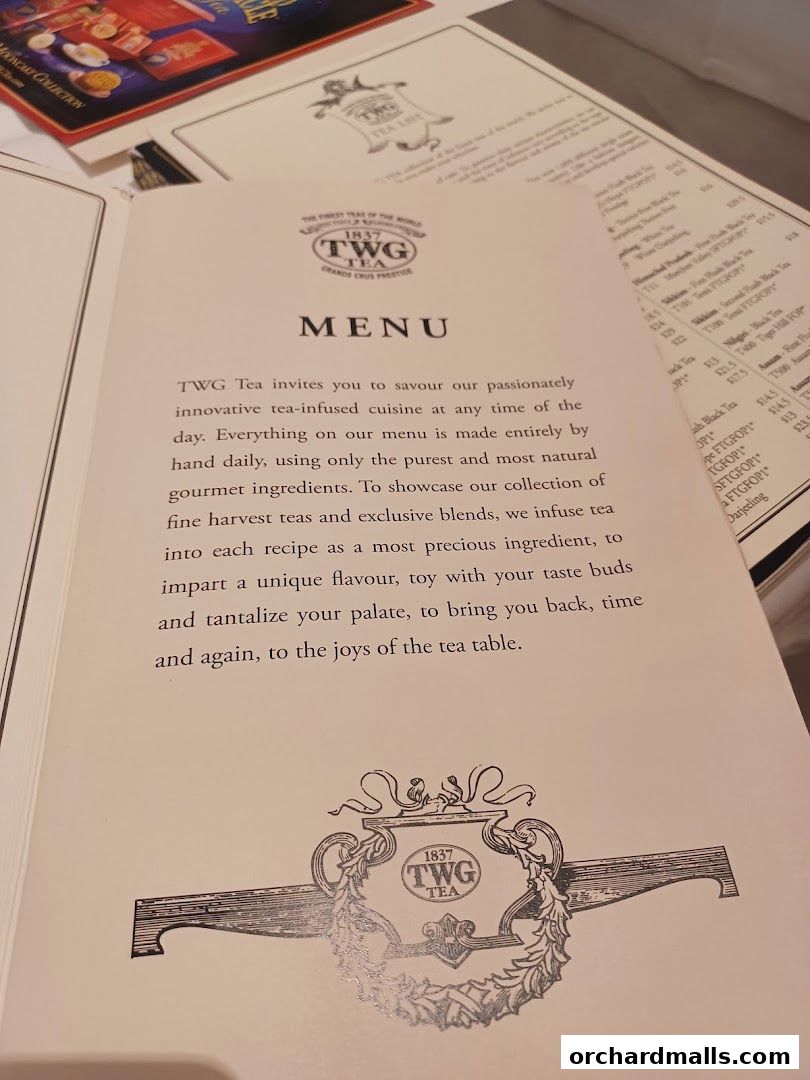 A menu from TWG Tea showcasing their tea-infused cuisine and exclusive blends.
