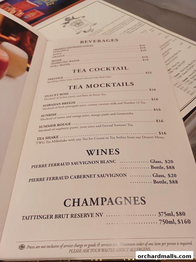 A menu from TWG Tea featuring beverages, tea cocktails, mocktails, wines, and champagnes.