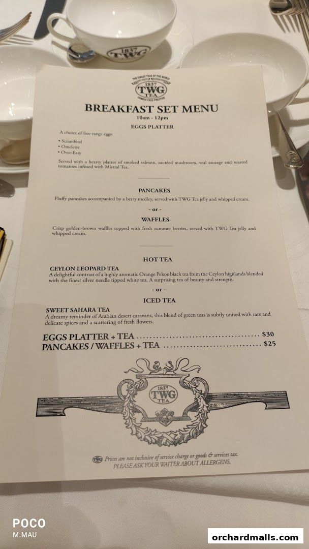 A breakfast set menu from TWG Tea at ION Orchard, featuring eggs, pancakes, waffles, and teas.