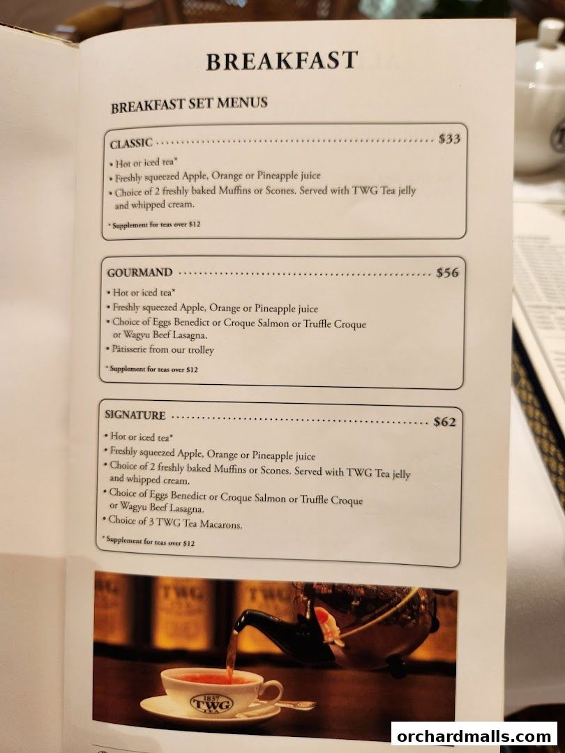 A menu page from TWG Tea featuring breakfast set menus with descriptions and prices.