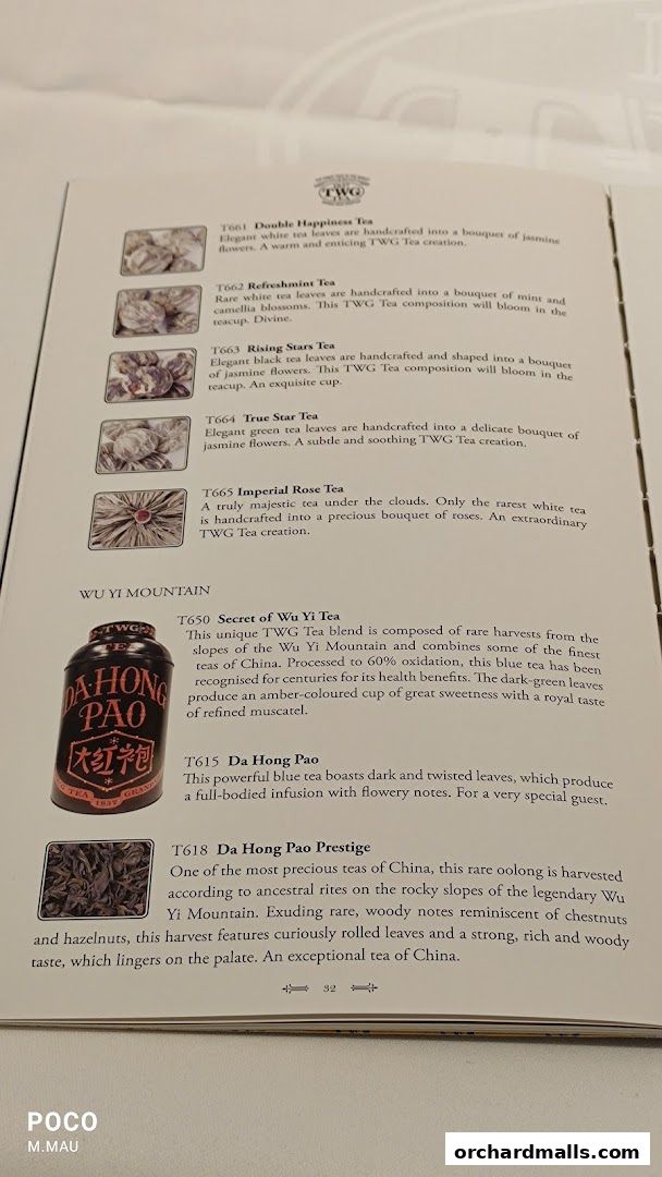 A menu page from TWG Tea showcasing various tea descriptions and images.