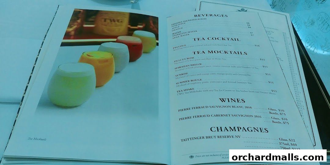 A menu from TWG Tea featuring beverages, tea cocktails, tea mocktails, wines, and champagnes.