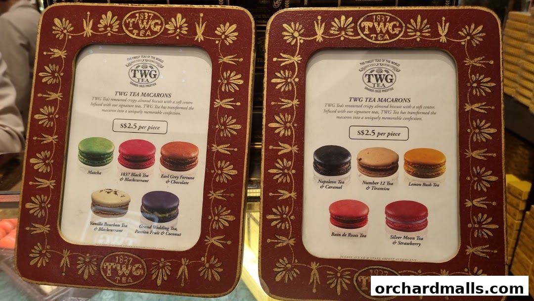 Display of TWG Tea macarons with various flavors and prices.