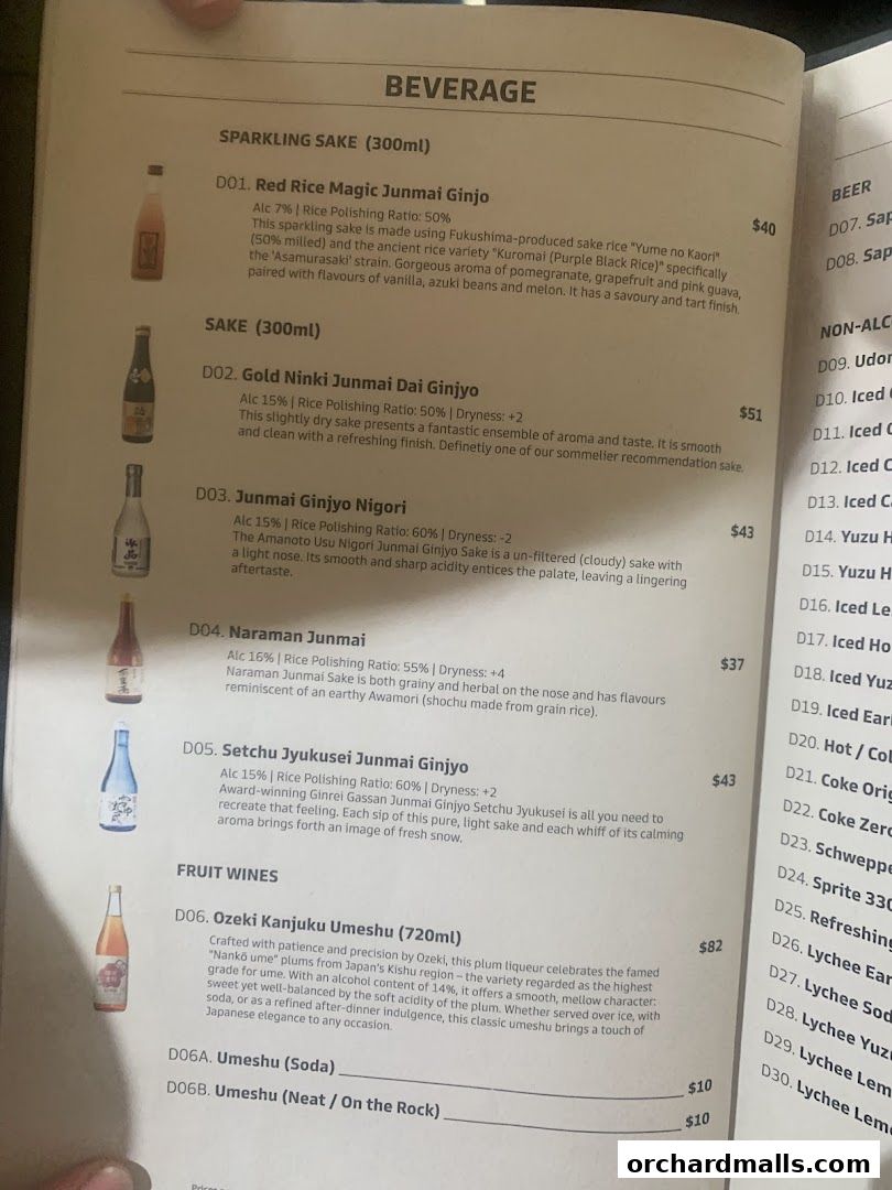 A menu page displaying various types of sake, fruit wines, and other beverages with prices.